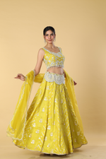 Load image into Gallery viewer, Yellow banarasi lehenga with broad belt paired with raw silk embroidered blouse  and organza dupatta
