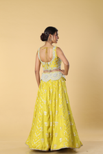 Load image into Gallery viewer, Yellow banarasi lehenga with broad belt paired with raw silk embroidered blouse  and organza dupatta
