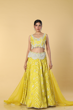 Load image into Gallery viewer, Yellow banarasi lehenga with broad belt paired with raw silk embroidered blouse  and organza dupatta
