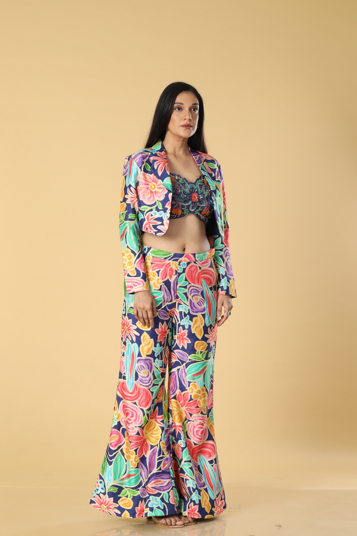Berry blue printed pants paired with multicolour hand embroidered bustier & jacket