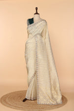 Load image into Gallery viewer, Off-White Banarasi Silk Saree with Meenakari Mirror &amp; Bead Work
