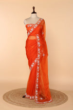 Load image into Gallery viewer, Tangerine Soft Organza Saree with Multicolour Sequin &amp; Cutdana Pearl Border
