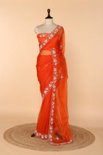 Load image into Gallery viewer, Tangerine Soft Organza Saree with Multicolour Sequin &amp; Cutdana Pearl Border
