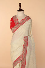 Load image into Gallery viewer, Beige Banarasi Crush Saree with Weaved Butti &amp; Red Border Embellished in Marodi, Sequin &amp; Zardosi
