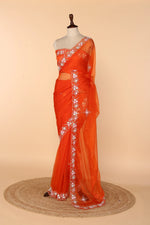 Load image into Gallery viewer, Tangerine Soft Organza Saree with Multicolour Sequin &amp; Cutdana Pearl Border
