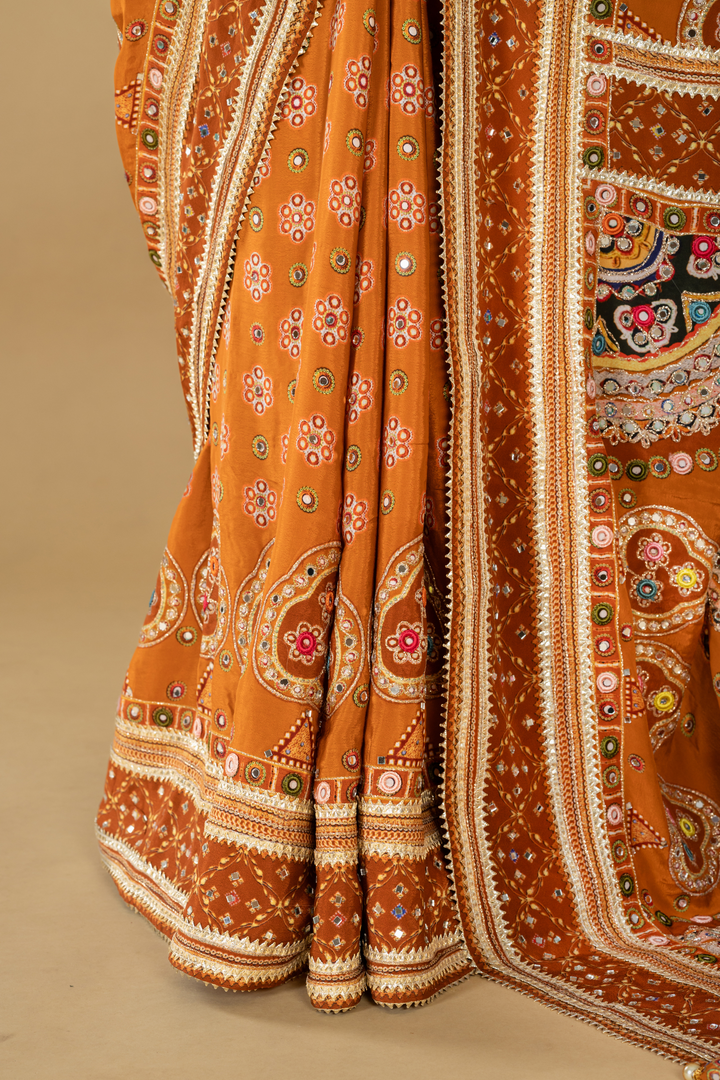 Yellow Ajrak printed highlightment saree paired with full sleeves blouse