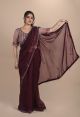 Wine Organza saree paired with hand embroidered blouse