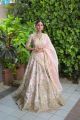 Beige story telling conceptual bridal lehenga