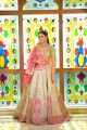 Ivory Bridal lehenga paired with contrast dupatta