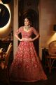 Red Bridal lehenga paired with sweetheart neck blouse and heavy dupatta